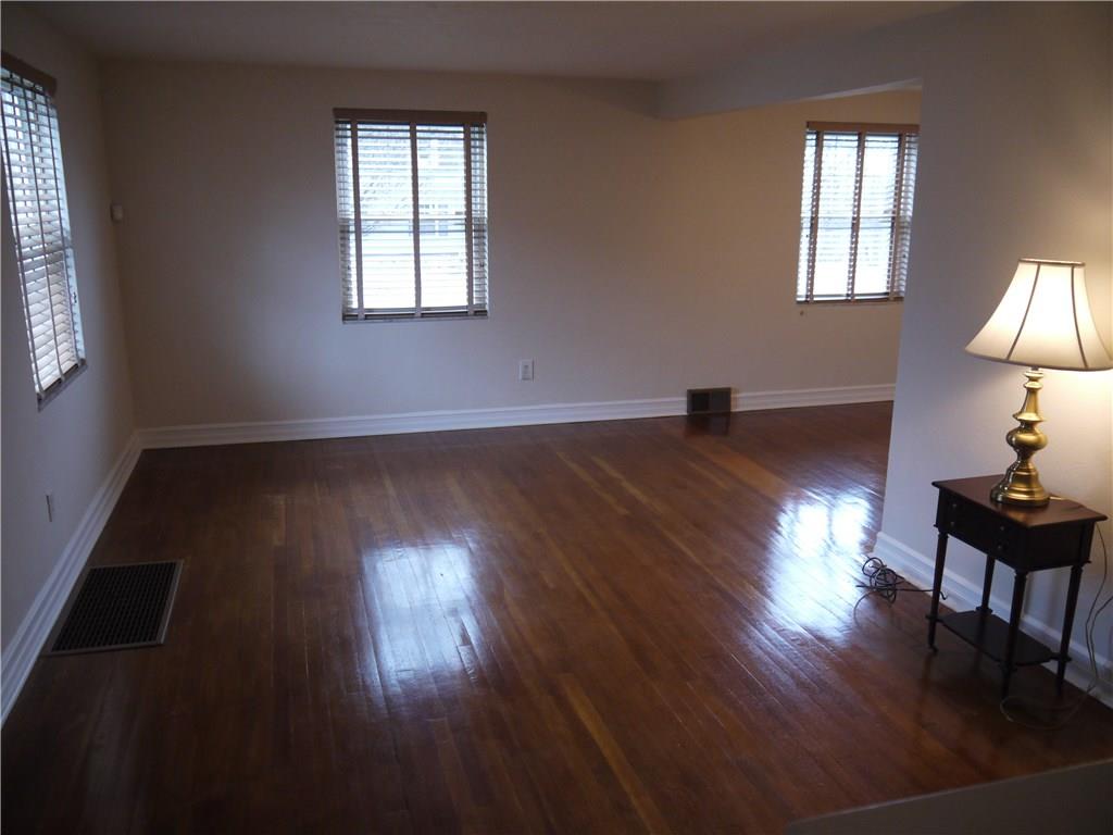 568 Highview Road Pittsburgh, PA 15234 - Photo 5 of 25 Easy flow between family room and dining room is excellent for entertaining.