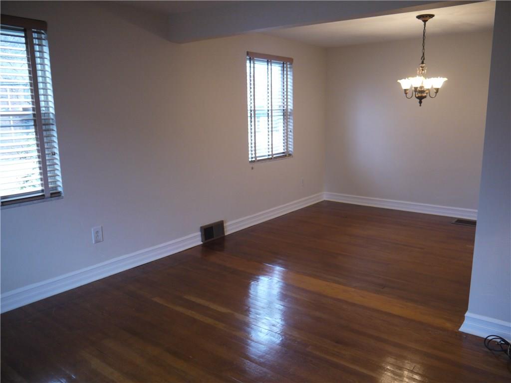 568 Highview Road Pittsburgh, PA 15234 - Photo 6 of 25 Blinds cover the windows and hardwoods grace the floors. Light and bright makes dining enjoyable!