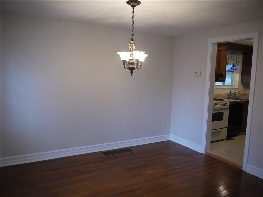 568 Highview Road Pittsburgh, PA 15234 - Photo 7 of 25 Large dining area leads into the adjoining kitchen.