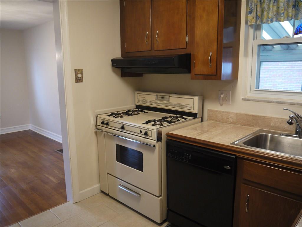 568 Highview Road Pittsburgh, PA 15234 - Photo 8 of 25 Ceramic floor and marble counters are some of the kitchen features.