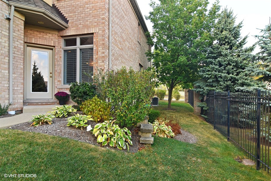 1532 West Rue James Place Palatine, IL 60067 - Photo 2 of 16 a view of a house with a yard and garden