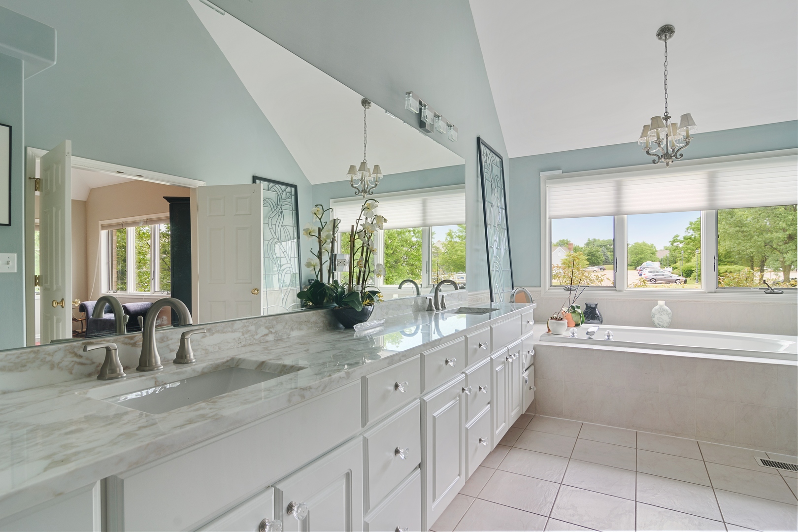 1532 West Rue James Place Palatine, IL 60067 - Photo 11 of 16 a large white kitchen with a large window and sink