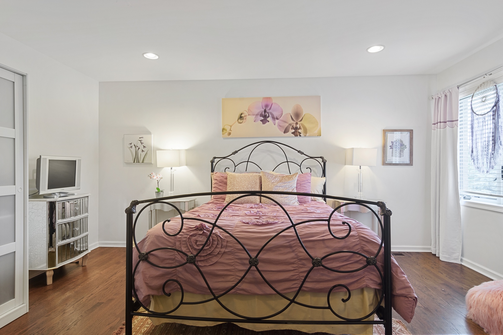 1532 West Rue James Place Palatine, IL 60067 - Photo 13 of 16 a bedroom with a bed and a flat screen tv