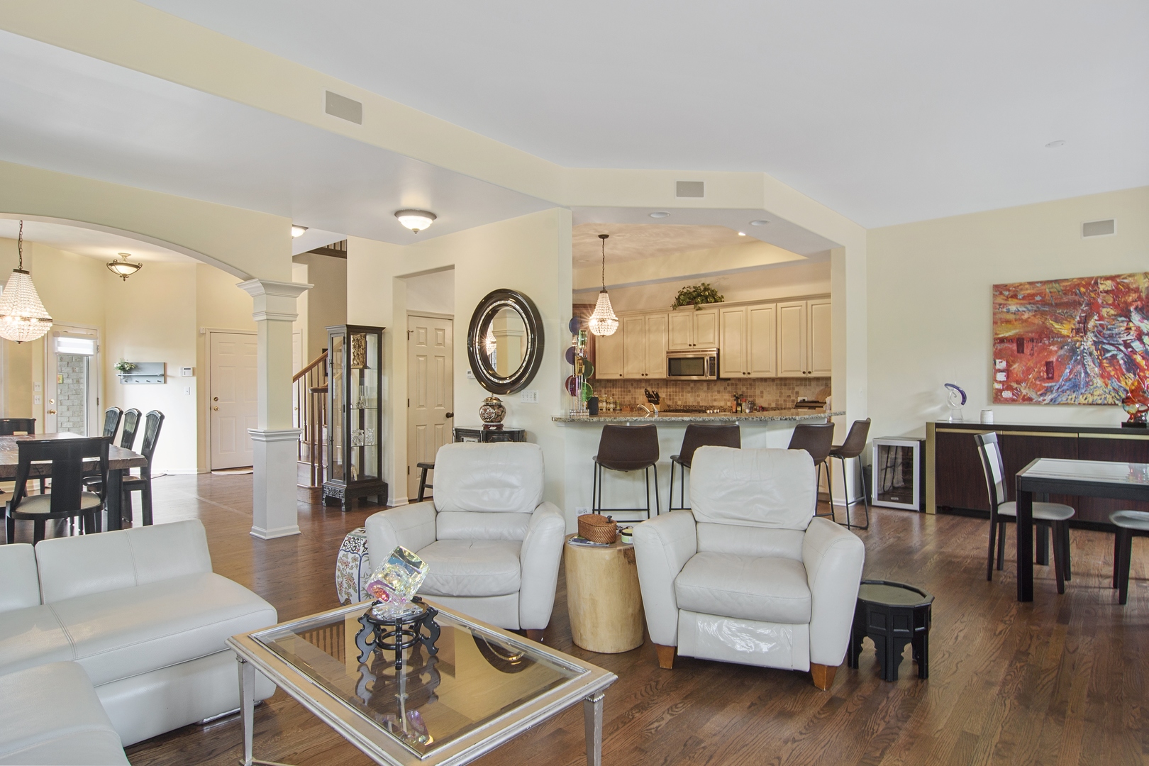 1532 West Rue James Place Palatine, IL 60067 - Photo 8 of 16 a living room with furniture and a large window