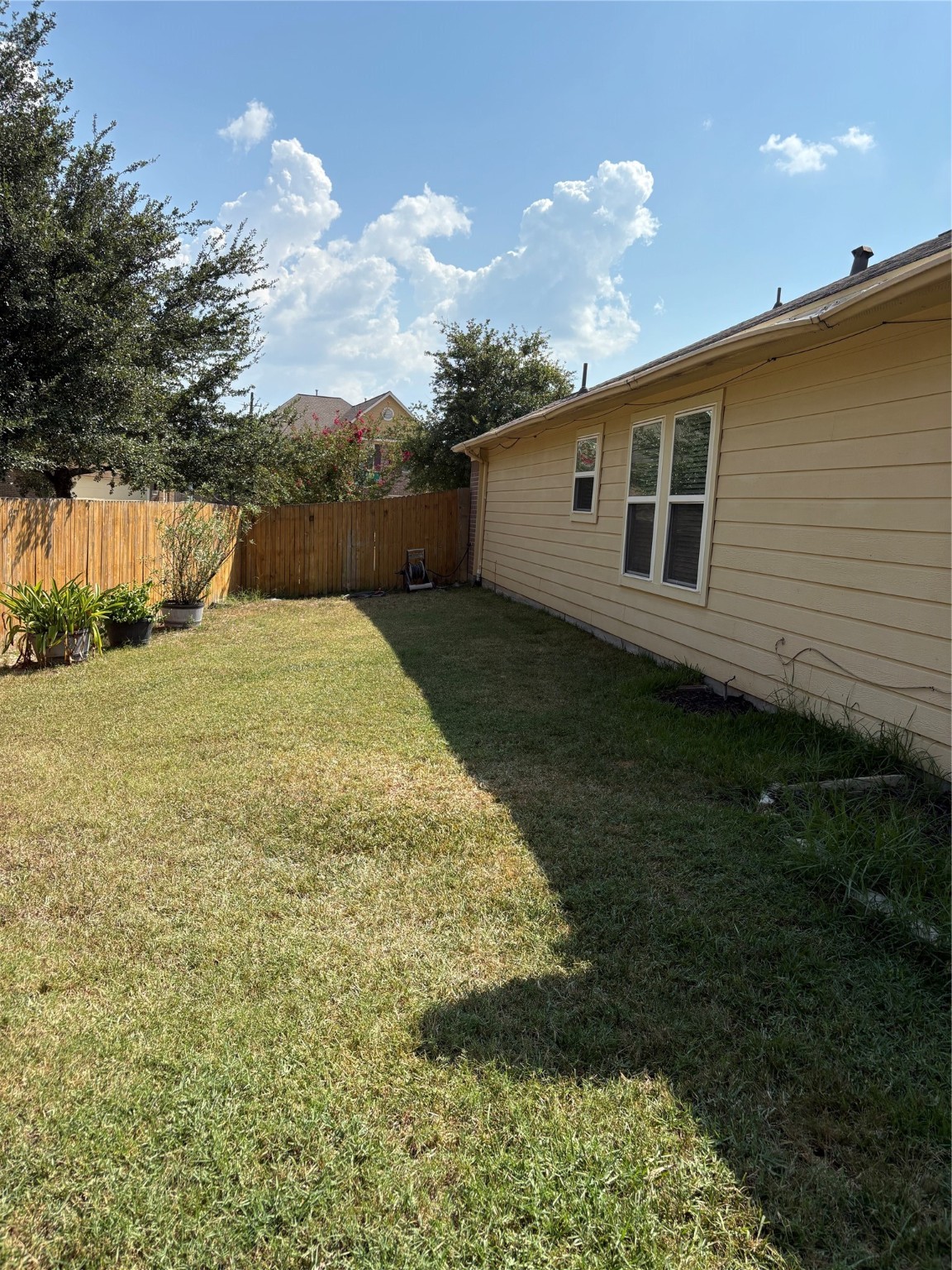 5051 Dappled Grove Trail Humble, TX 77346 - Photo 4 of 6 a backyard of a house