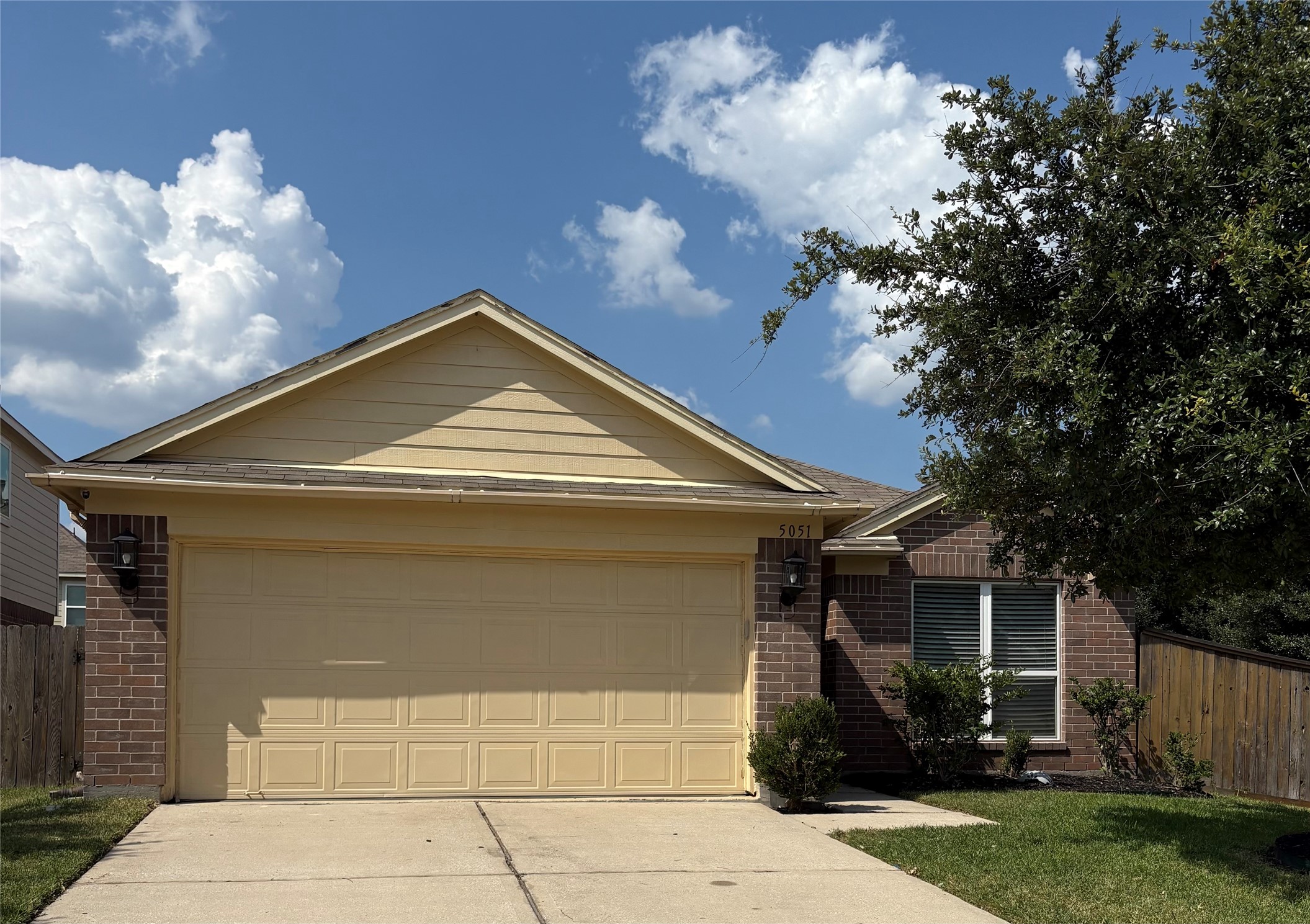 5051 Dappled Grove Trail Humble, TX 77346 - Photo 6 of 6 a front view of a house with garden