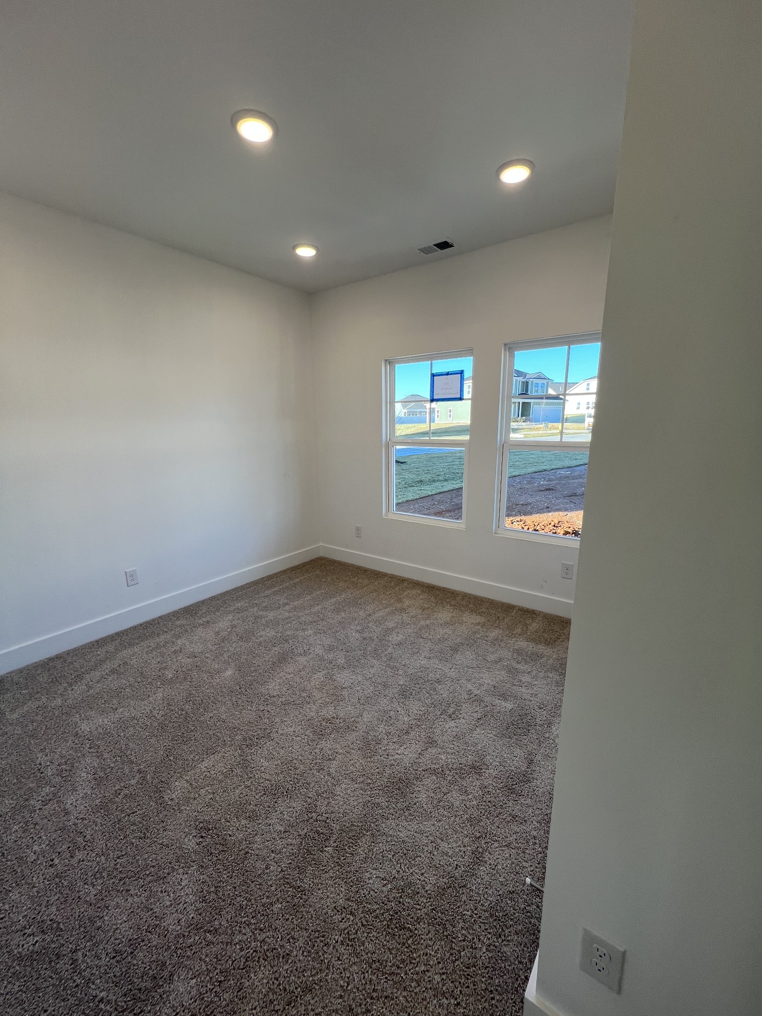 309 Strong Street Columbia, TN 38401 - Photo 14 of 33 an empty room with windows