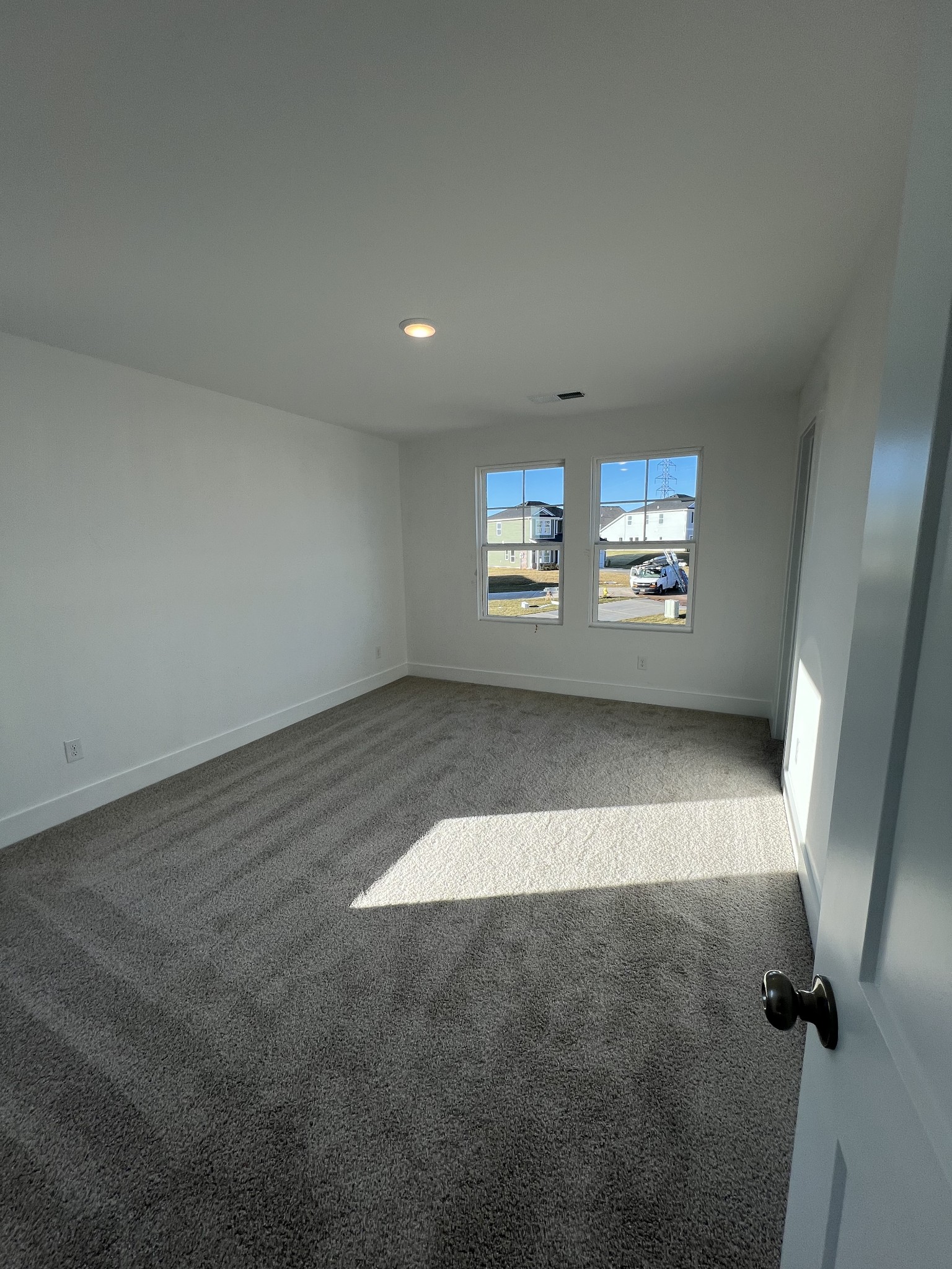 309 Strong Street Columbia, TN 38401 - Photo 20 of 33 an empty room with windows and entrance