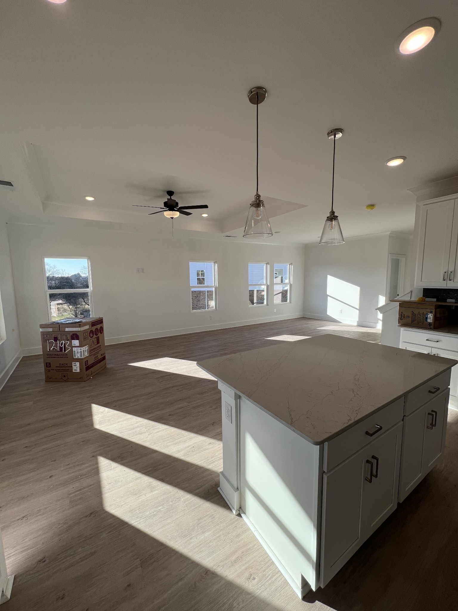 309 Strong Street Columbia, TN 38401 - Photo 4 of 33 a kitchen with kitchen island a counter top a stove a sink and a refrigerator