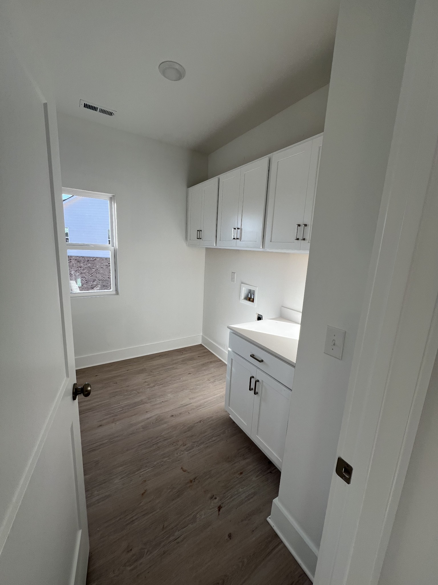 309 Strong Street Columbia, TN 38401 - Photo 9 of 33 a view of a storage and utility area in a kitchen