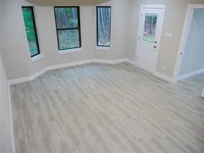 an empty room with windows