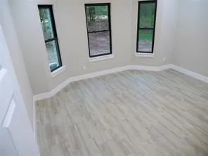 an empty room with windows