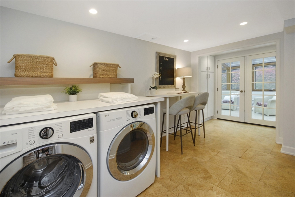 213 Nashoba Road Concord, MA 01742 - Photo 14 of 33 a view of kitchen and washer and dryer