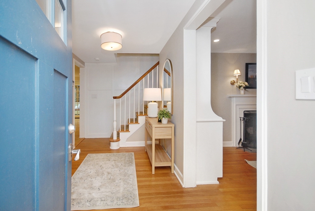 213 Nashoba Road Concord, MA 01742 - Photo 2 of 33 a view of a living room with a wooden floor