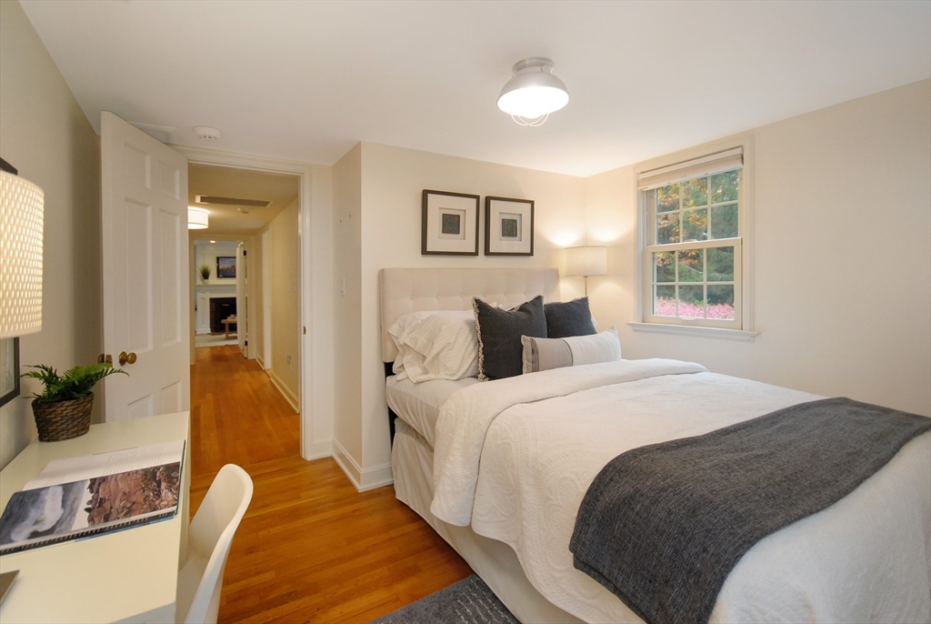 213 Nashoba Road Concord, MA 01742 - Photo 21 of 33 a bedroom with bed and a large window