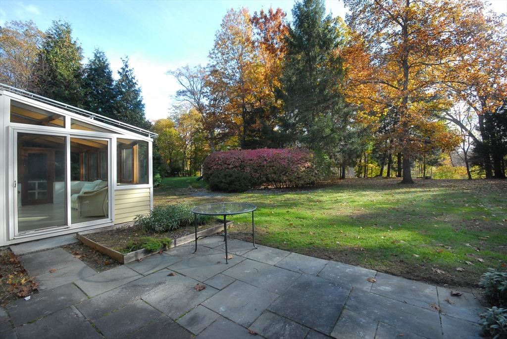 213 Nashoba Road Concord, MA 01742 - Photo 30 of 33 a view of a house with a yard