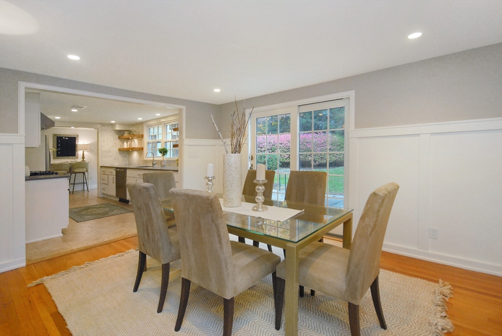 213 Nashoba Road Concord, MA 01742 - Photo 7 of 33 a view of a dining room with furniture and wooden floor