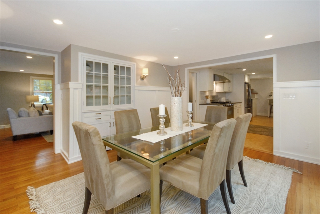 213 Nashoba Road Concord, MA 01742 - Photo 8 of 33 a view of a dining room with furniture and wooden floor