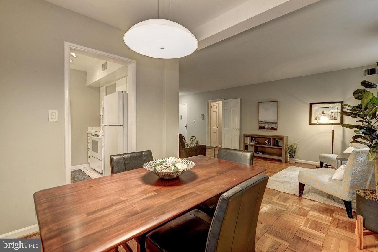 3500 39th Street Northwest, Unit B668 Washington, DC 20016 - Photo 2 of 30 a view of a dining room with furniture