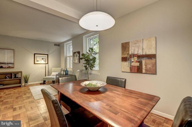3500 39th Street Northwest, Unit B668 Washington, DC 20016 - Photo 3 of 30 a view of a dining room with furniture