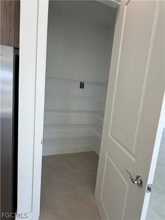 a stove top oven sitting inside of a kitchen