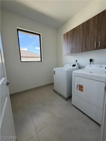 a view of an empty room with stairs