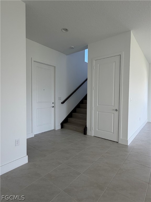 5166 Julienne Road Immokalee, FL 34142 - Photo 18 of 29 a view of an empty room with stairs