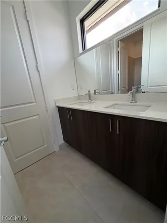 a view of an empty room with windows