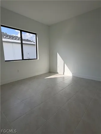 a view of empty room with a window