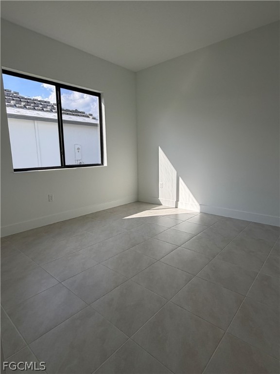 5166 Julienne Road Immokalee, FL 34142 - Photo 24 of 29 a view of an empty room with windows