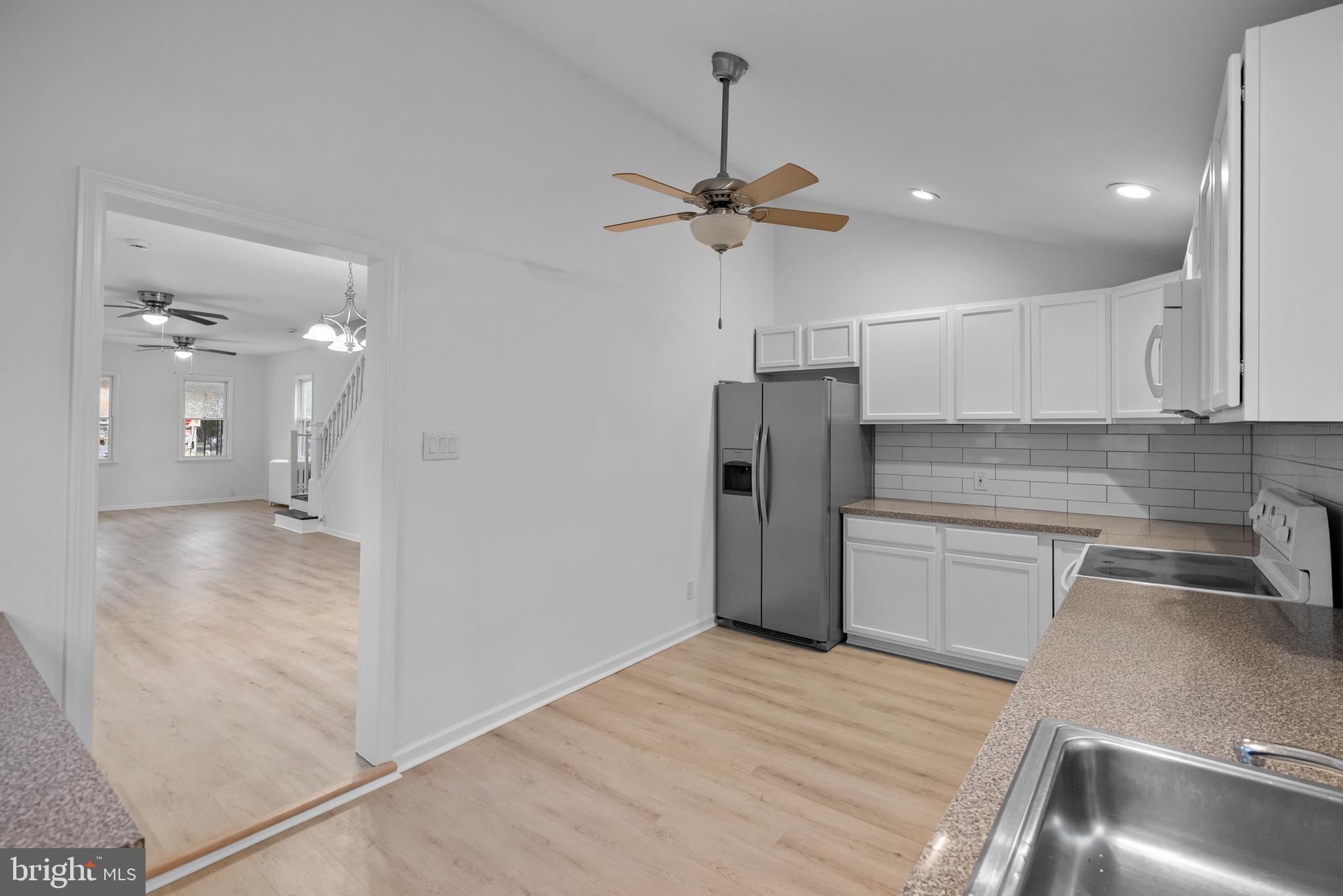 99 Chews Landing Road Clementon, NJ 08021 - Photo 13 of 37 a kitchen with stainless steel appliances a refrigerator and a sink