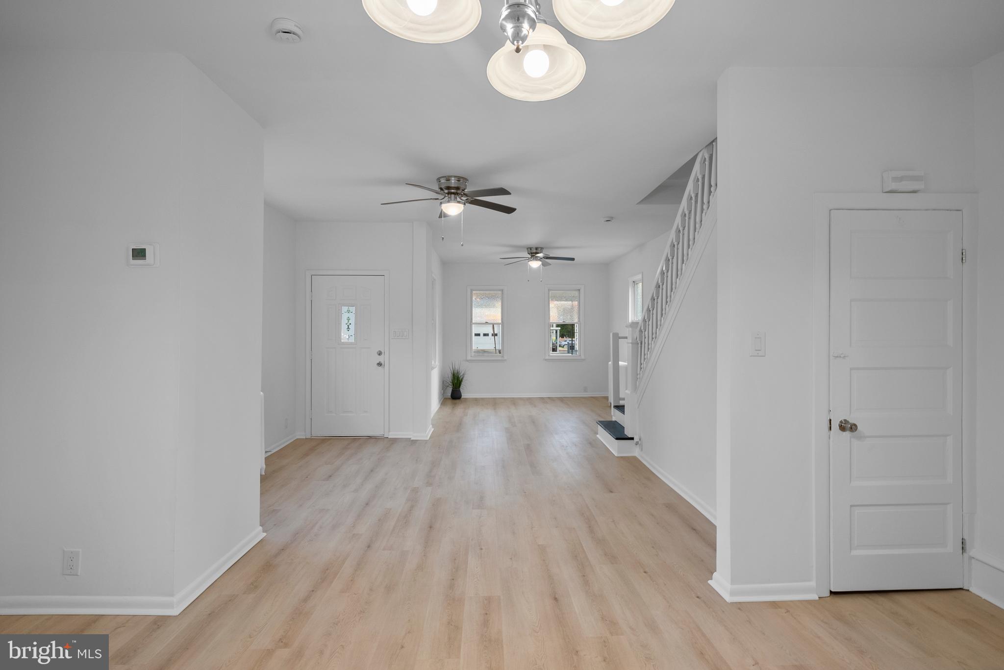 99 Chews Landing Road Clementon, NJ 08021 - Photo 7 of 37 wooden floor in an empty room with a window
