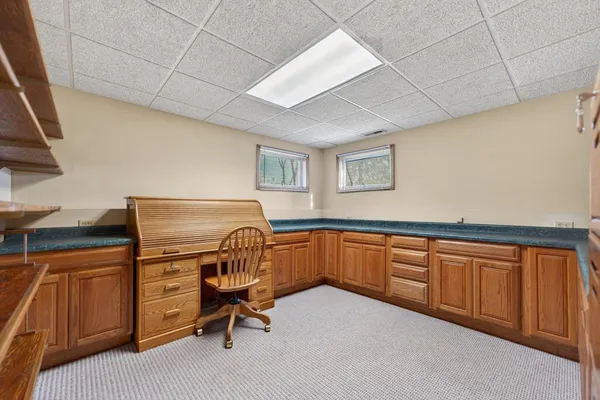 a picture of floor with a white wall