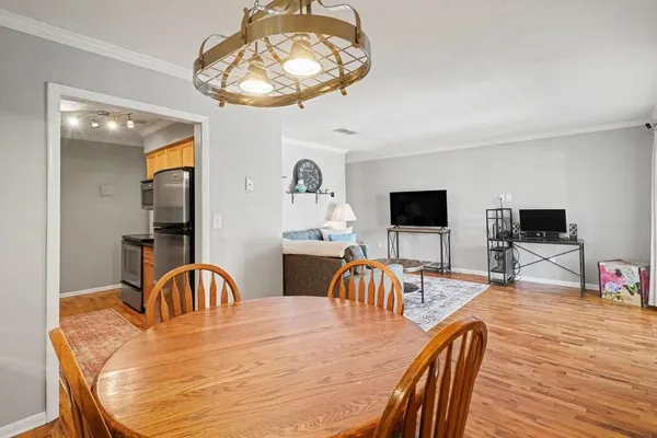 a view of a dining room with furniture