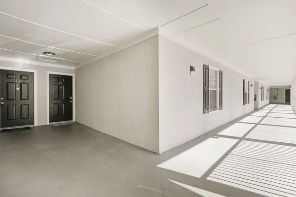 a view of a hallway with closet