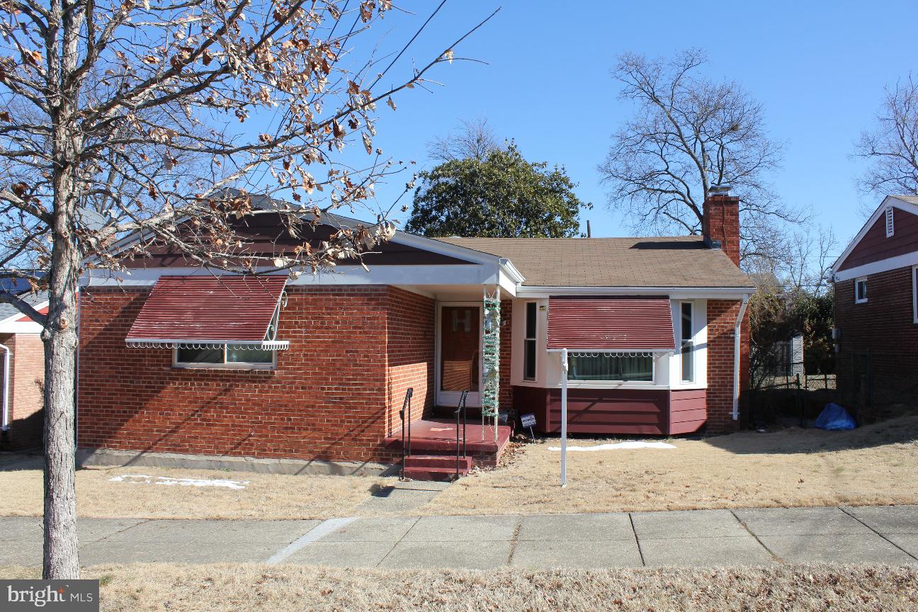 a front view of a house with a garage