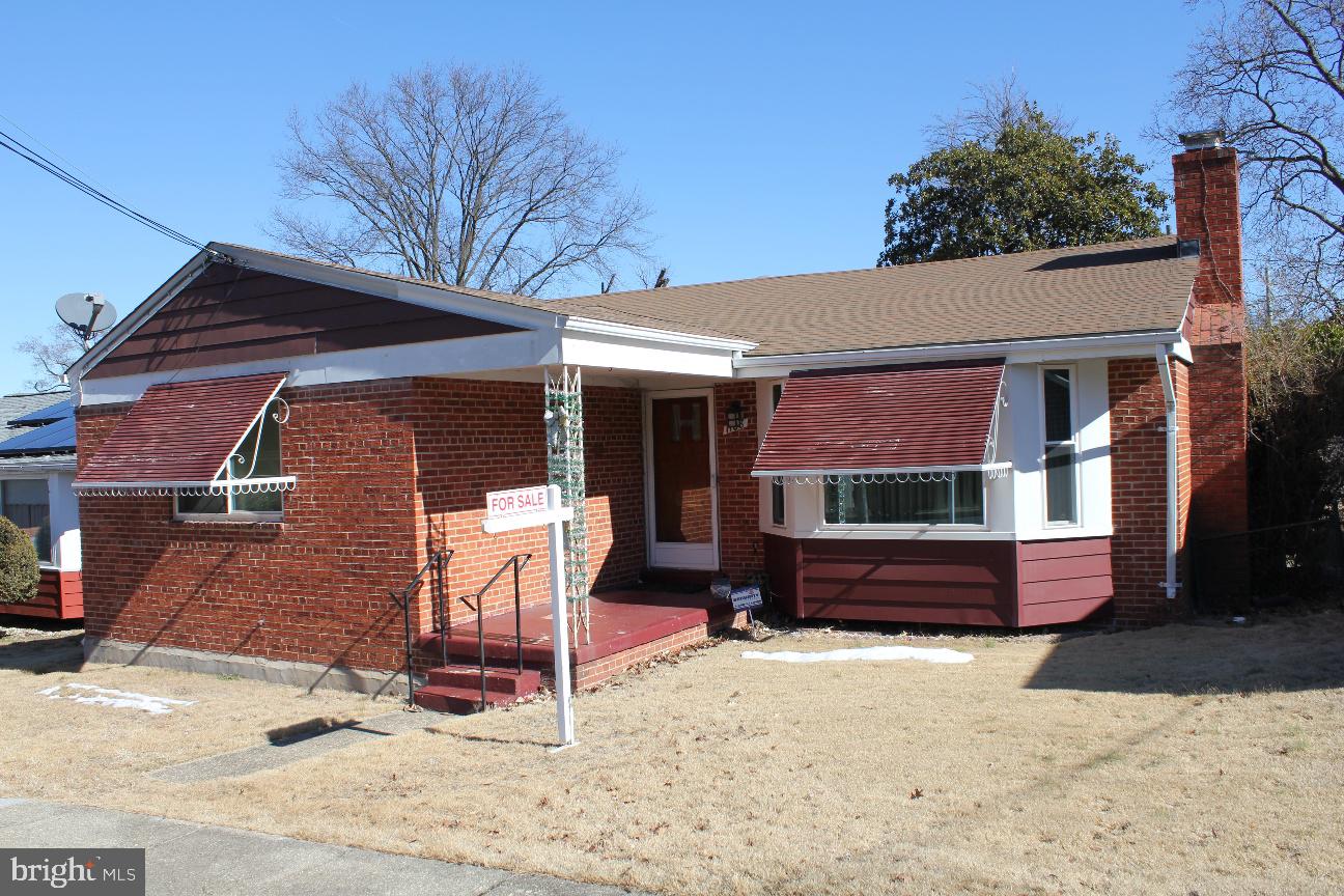 1108 Chaplin Street Southeast Washington, DC 20019 - Photo 2 of 35 a front view of a house with a yard