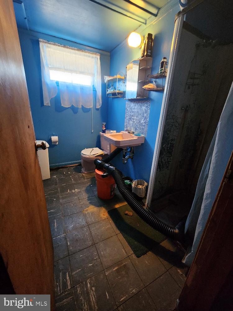 1108 Chaplin Street Southeast Washington, DC 20019 - Photo 24 of 35 a bathroom with a sink and a toilet