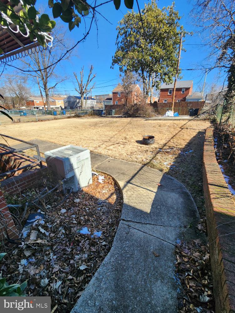 1108 Chaplin Street Southeast Washington, DC 20019 - Photo 30 of 35 a view of a yard with an outdoor space