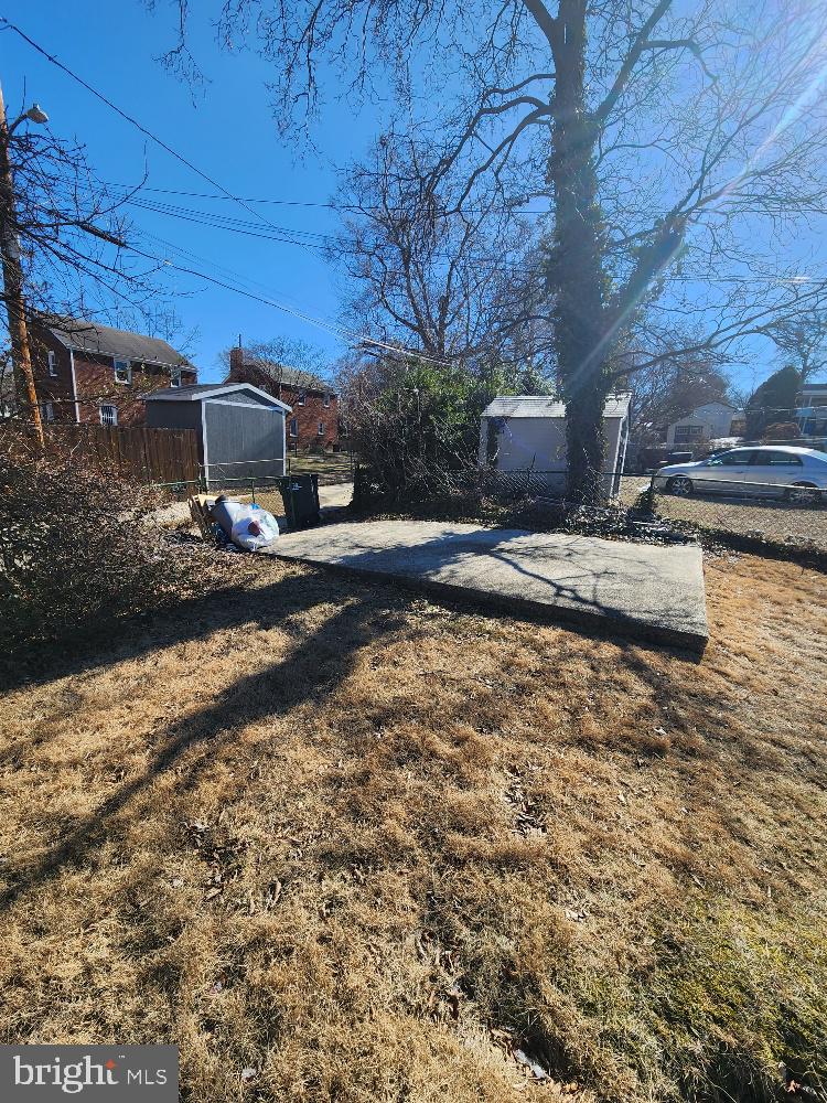 1108 Chaplin Street Southeast Washington, DC 20019 - Photo 32 of 35 a view of a yard with car parked