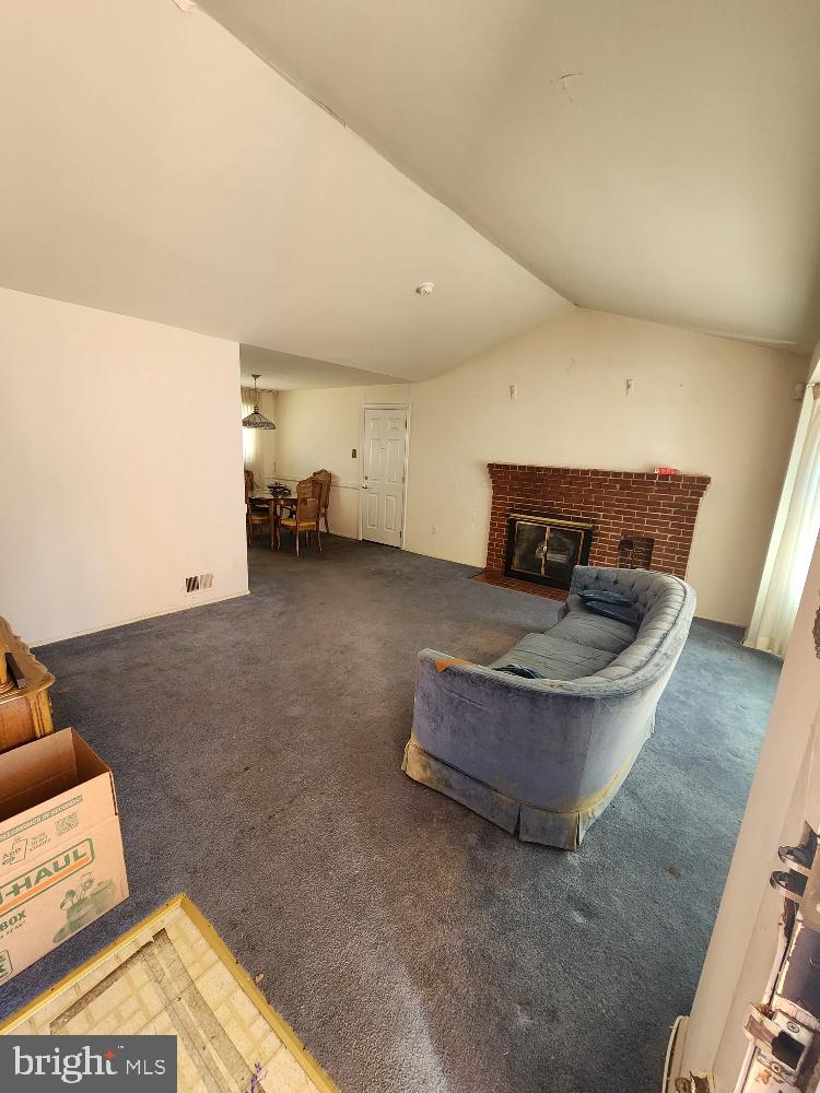 1108 Chaplin Street Southeast Washington, DC 20019 - Photo 6 of 35 a living room with furniture and a couch