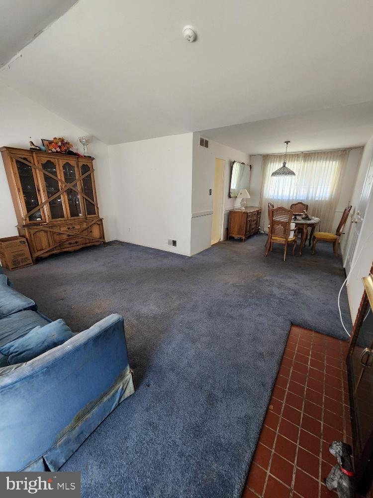 1108 Chaplin Street Southeast Washington, DC 20019 - Photo 8 of 35 a living room with furniture and a couch