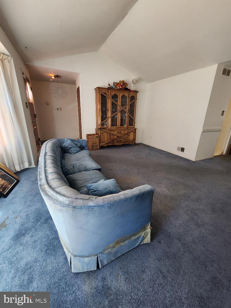1108 Chaplin Street Southeast Washington, DC 20019 - Photo 9 of 35 a living room with furniture and a flat screen tv