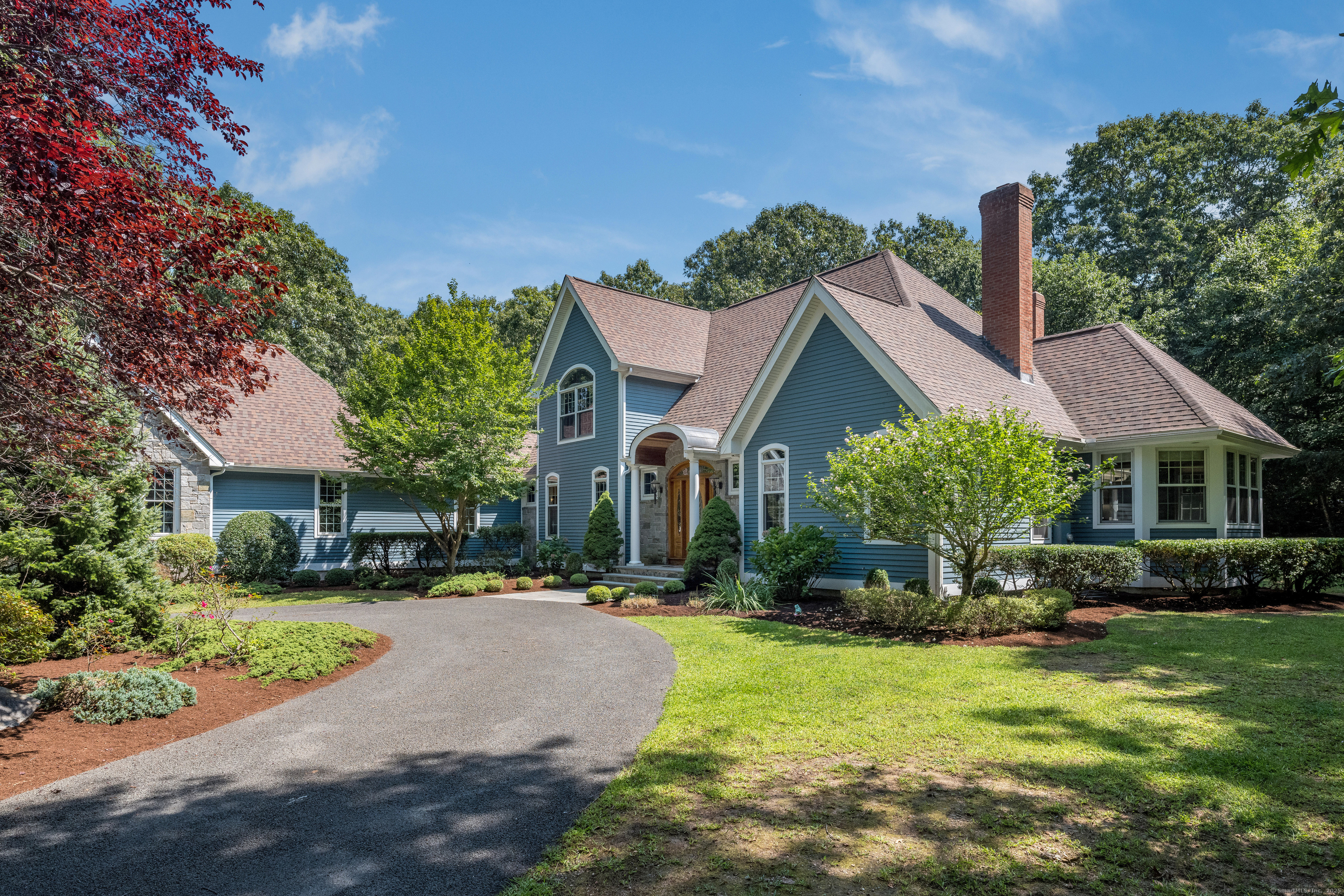 30 Watrous Point Road Old Saybrook, CT 06475 - Photo 1 of 1 a front view of a house with a yard