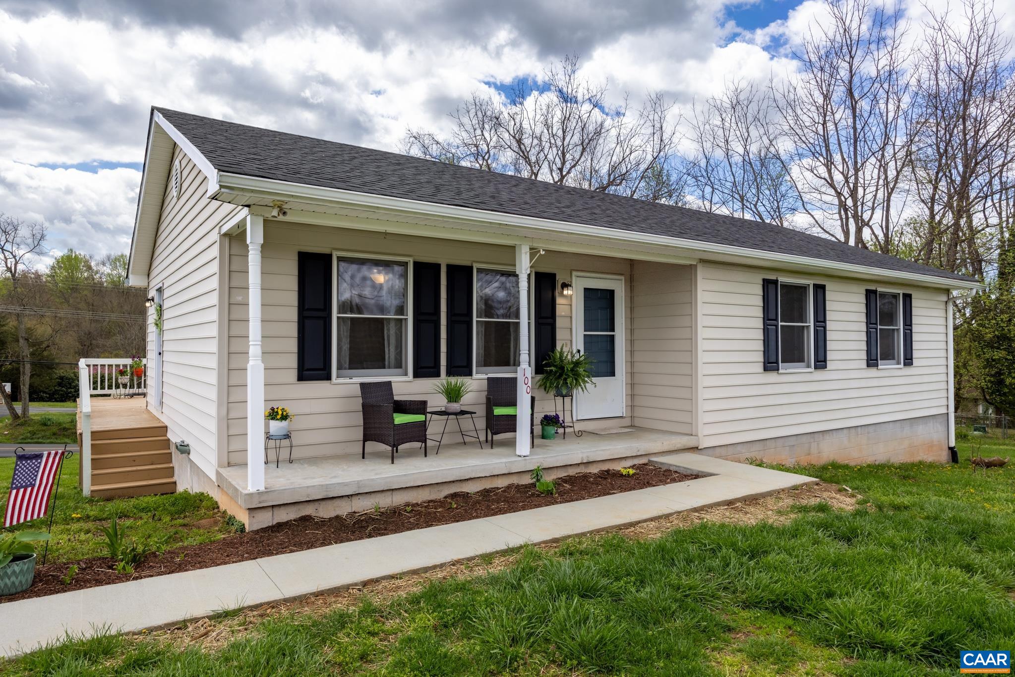 100 East Daffodil Road Ruckersville, VA 22968 - Photo 1 of 41 a front view of house with yard and outdoor seating