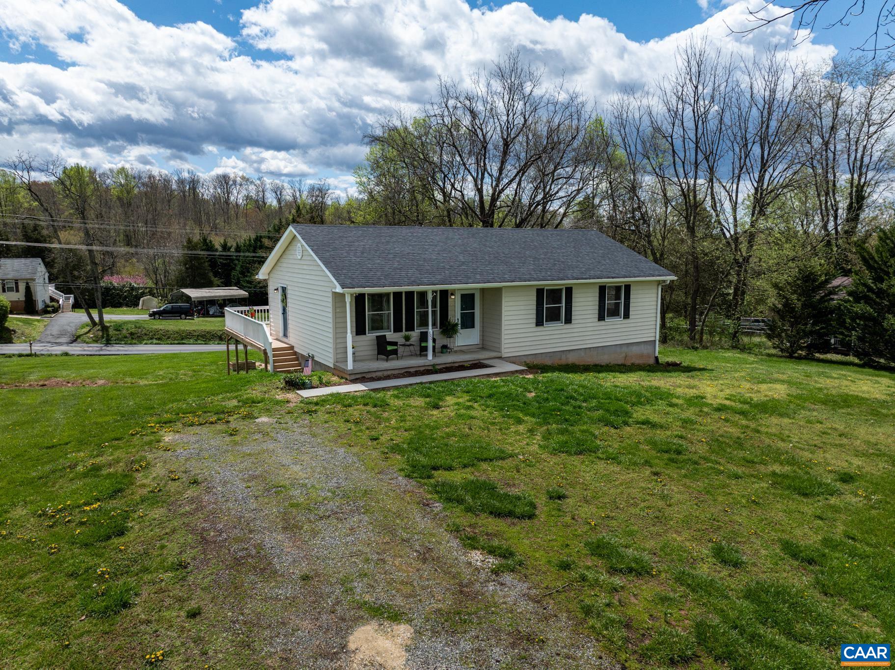 100 East Daffodil Road Ruckersville, VA 22968 - Photo 2 of 41 a view of a yard in front of house