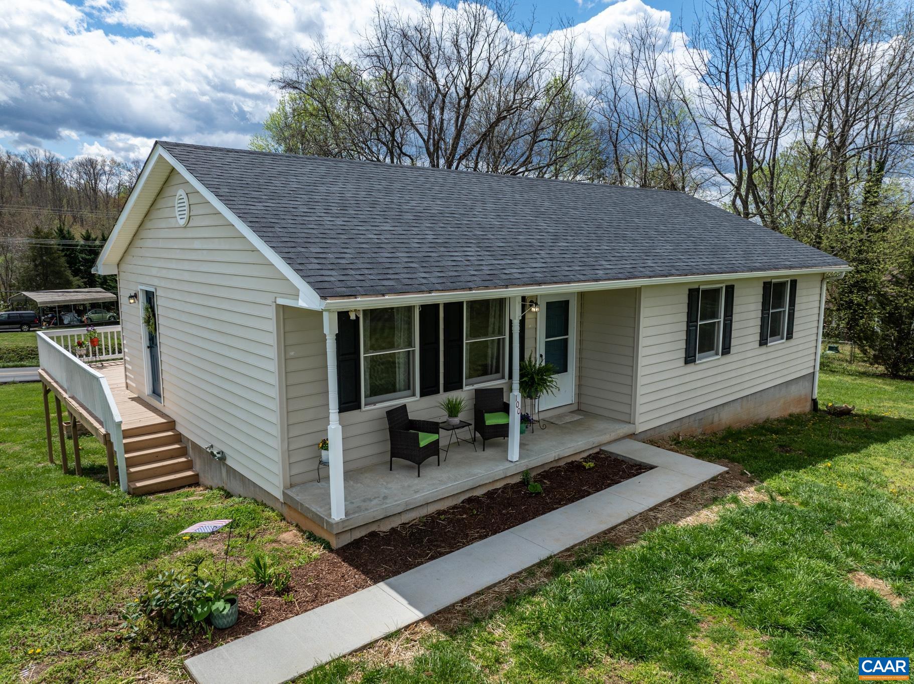 100 East Daffodil Road Ruckersville, VA 22968 - Photo 3 of 41 a front view of a house with garden