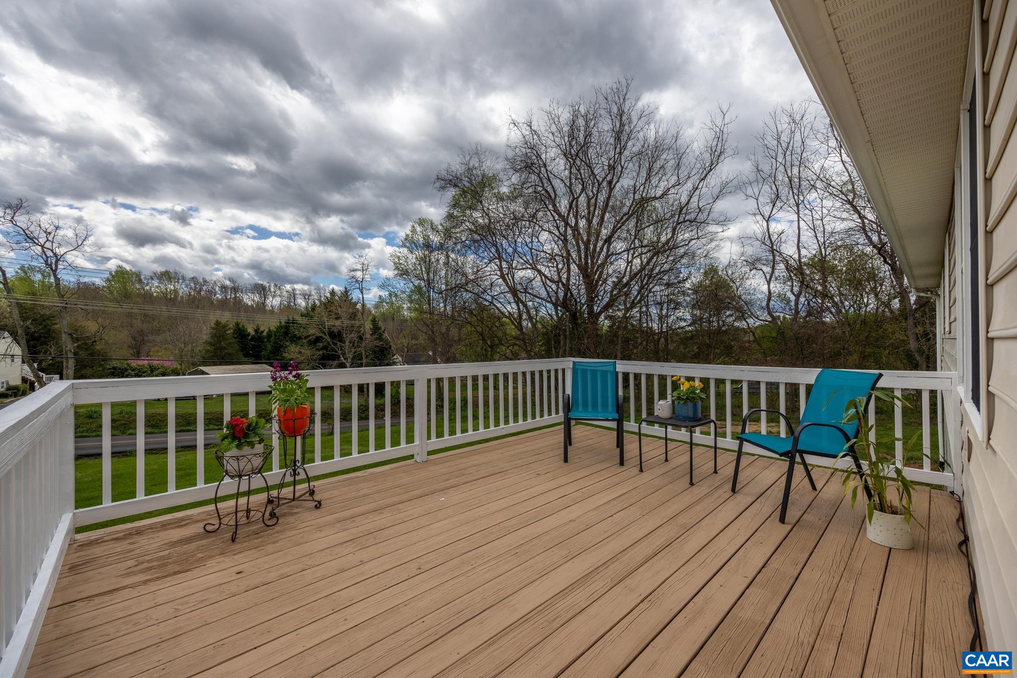 100 East Daffodil Road Ruckersville, VA 22968 - Photo 6 of 41 a view of balcony with deck and wooden floor