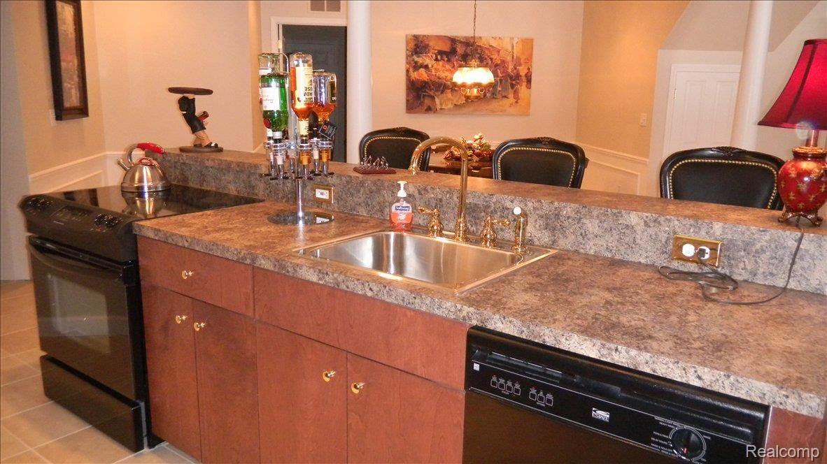 5043 Belmonte Drive, Unit 65 Rochester, MI 48306 - Photo 17 of 25 Kitchen in Basement