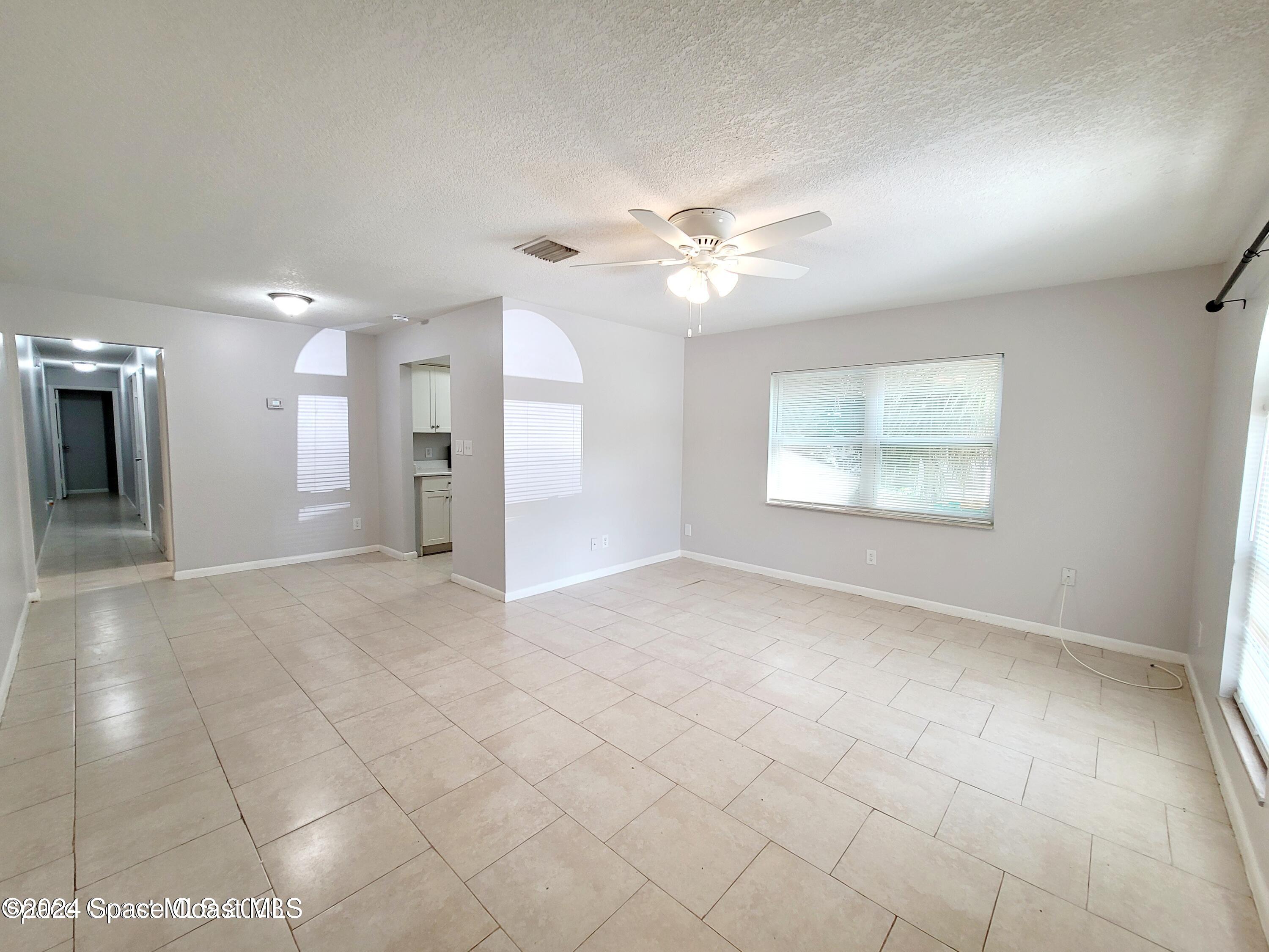 419 Audubon Drive, Unit B Melbourne, FL 32901 - Photo 5 of 11 Living/ Dining